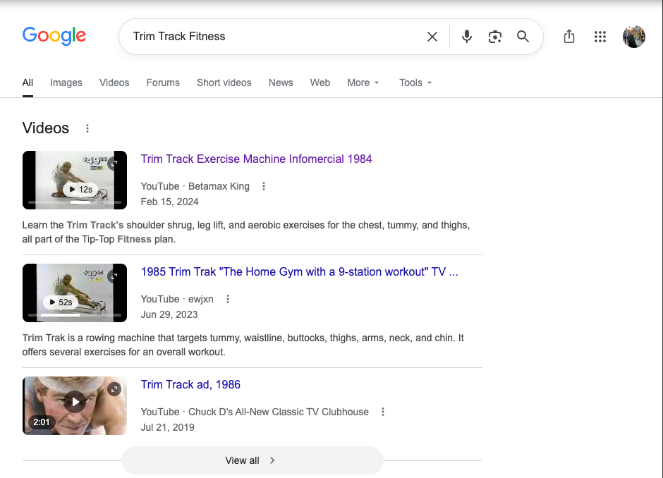 Google 搜索 Trim Track Fitness 后显示历史电视广告和产品视频